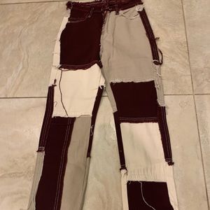 Empty soda patchwork jeans.